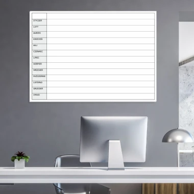 Annual planner whiteboard 009 - Office setup with light-colored walls and modern furniture.