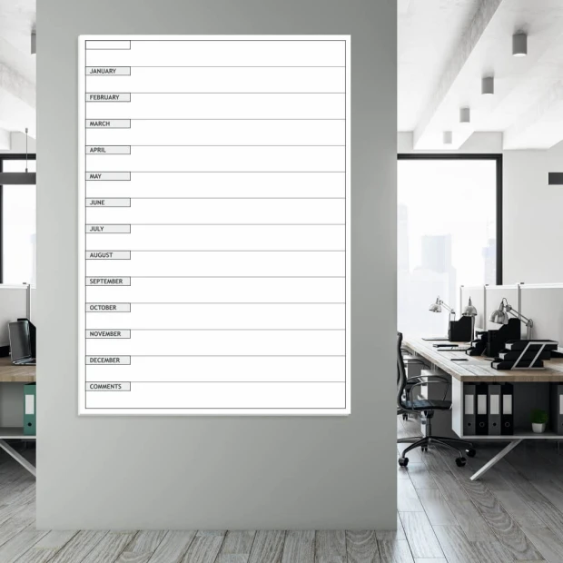 Annual planner whiteboard en 008 - Office setup with gray walls, light furniture, and large windows.