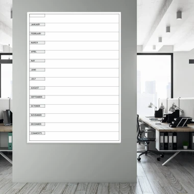 Annual planner whiteboard en 008 - Office setup with gray walls, light furniture, and large windows.