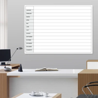 Annual planner whiteboard en 010 - Office setup with light-colored walls and brown furniture.