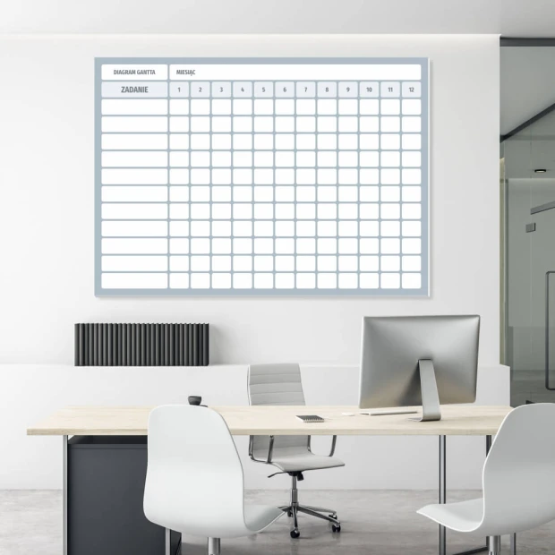 Magnetic whiteboard with Gantt chart for annual monthly breakdown, ideal for office organization.