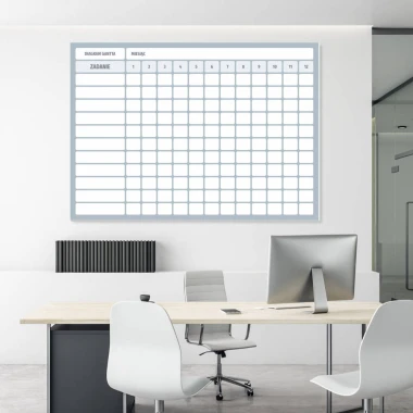 Magnetic whiteboard with Gantt chart for annual monthly breakdown, ideal for office organization.
