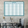 Lean 114 dry-erase meeting calendar board - Office setup with gray-beige walls, minimalist design.