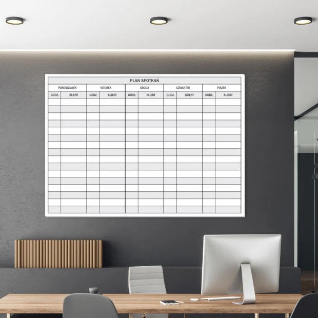 Dry-erase meeting planner board 087 - Office arrangement with gray walls and minimalist furniture.