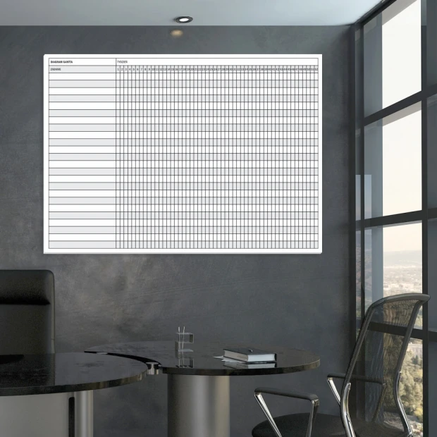 Yearly Gantt chart whiteboard with weekly divisions for office arrangement. Wall in shade.