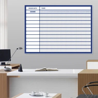Annual Gantt chart whiteboard divided by weeks, ideal for office arrangement. Light-colored walls.