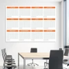 Universal dry-erase annual calendar 459 - Office setup with light walls and gray furniture.