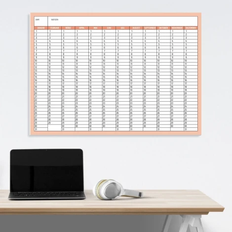 Universal dry-erase calendar, German version 281 - Office setup with light-colored walls and a natural wood table.