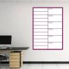 Dry-erase meeting planner with weekly calendar 265 - Office setup with light walls and dark desk.