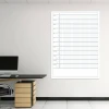 Magnetic dry-erase calendar board in English, ideal for office decor with light-colored walls and furniture.