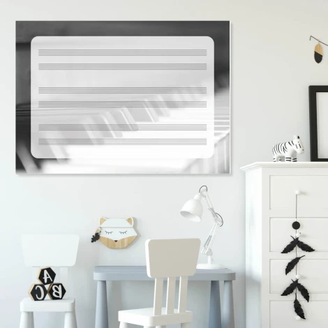 Magnetic whiteboard with five lines for piano, perfect for a child\'s room with light-colored walls.