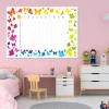 Magnetic dry-erase multiplication chart 038 - Decor in a children\'s room with pink walls and furniture.