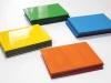 Custom dry-erase magnetic sheets in green, blue, yellow, and orange with a graphic design.
