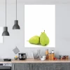 Dry-erase board for the kitchen featuring a graphic design of two green pears on a white background.