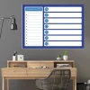 Dry-erase planner board 243 - Office setup with light-colored walls and wooden furniture accents.