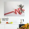 Dry-erase board with 209 cutlery pieces - Graphic design. Cutlery arranged on a white background, wrapped in a red ribbon.