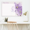 Daily planner whiteboard with flowers 357 - Office setup with bright walls and minimalist furniture.