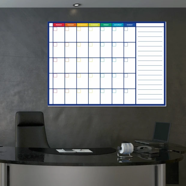 Weekly dry-erase planner in English 389 - Office setup with gray walls and modern furniture.