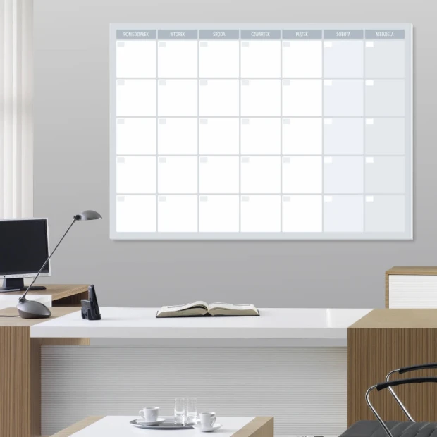 Weekly planner whiteboard 513 - Office arrangement with light-colored walls and brown furniture.