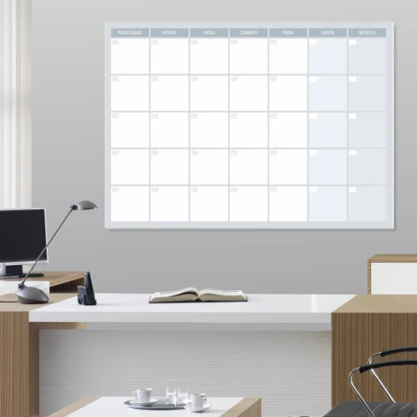 Weekly planner whiteboard 513 - Office arrangement with light-colored walls and brown furniture.