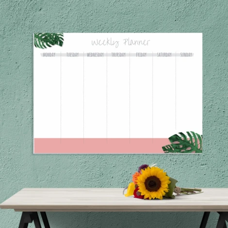 Weekly planner dry-erase board 409 - Office setup with green walls and a light wood table.