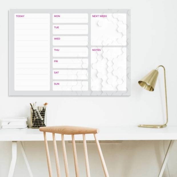 Weekly planner dry-erase board 427 - Office setup with light walls, wooden chair, and lamp.