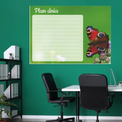 Butterfly dry-erase daily planner 365 - Office setup with green wall, white furniture, and plants.