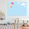 Dry-erase board for girls with cloud design, perfect for a child\'s room. Light-colored walls and flooring.