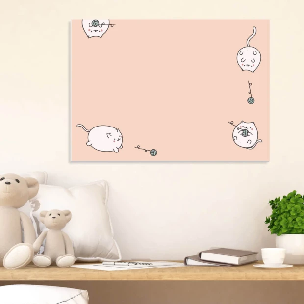 Dry-erase board for kids with playful cat designs on a pink background featuring cats playing with yarn.
