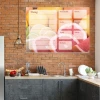 Weekly planner dry-erase board with grapefruit design - Kitchen decor featuring brick walls and dark furniture.