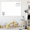Dry-erase board for kids with a moon and cloud design on a white background.