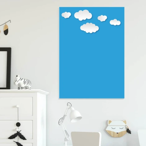 Dry-erase board for kids with cloud design, perfect for bright children\'s room decor with light walls and white furniture.