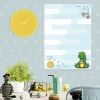 Dinosaur dry-erase board for kids - Decorated in a bright children\'s room with light walls and white polka dots.