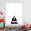 Dry-erase board for kids featuring a black bear in a pom-pom hat on a white background.