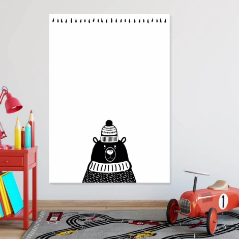 Dry-erase board for kids featuring a black bear in a pom-pom hat on a white background.