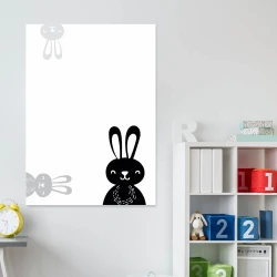Children\'s dry-erase board featuring two bunnies in different colors on a white background.