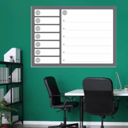 Dry-erase board planner 244 - Office setup with a green wall, white furniture, and black chairs.