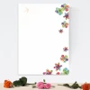 Colorful flowers magnetic whiteboard 082 - Graphic design. Flowers in various colors in the corner on a white background.