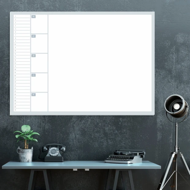 Weekly planner whiteboard 506 - Office setup with dark walls and a table featuring metal accents.