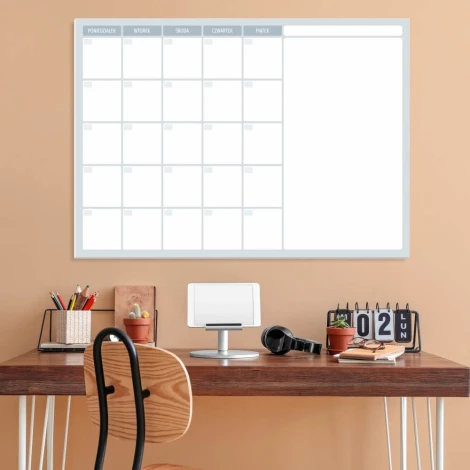 Weekly planner whiteboard 509 - Office setup with light walls, wooden desk, and minimalist furniture.