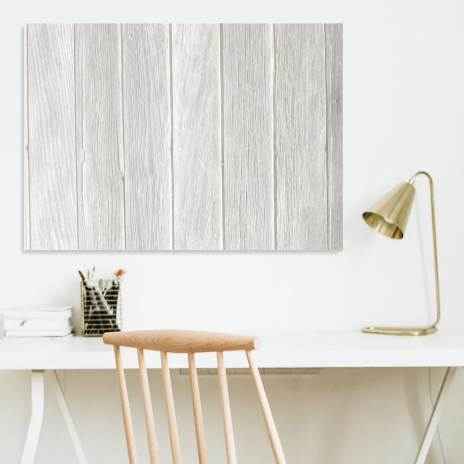 Whiteboard with a magnetic surface, ideal for office decor. Light-colored walls and minimalist furniture.
