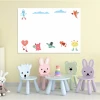 Magnetic dry-erase board for kids featuring colorful monster characters on a white background.