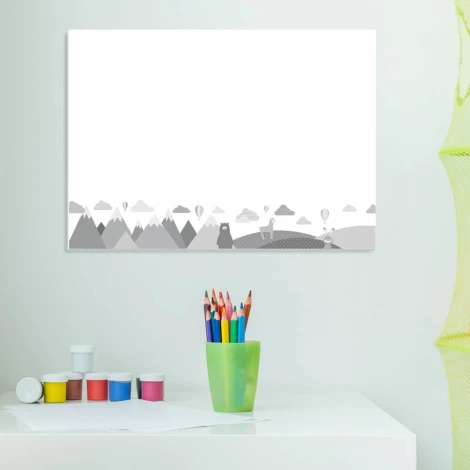 Magnetic dry-erase board for kids featuring animals and mountains, with a graphic design of mountains and clouds.