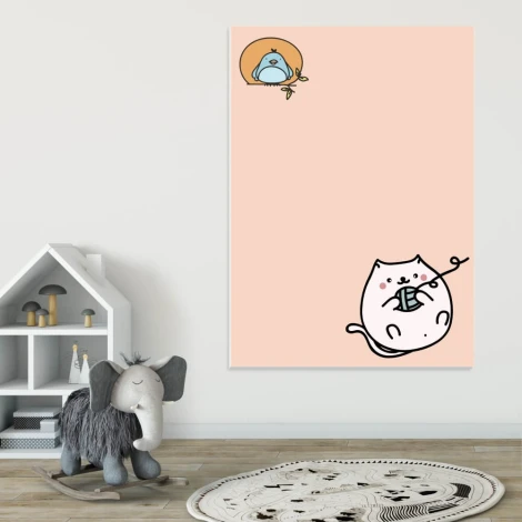 Dry-erase magnetic board with cat and bird design, perfect for a child\'s room with light-colored walls and stylish furniture.