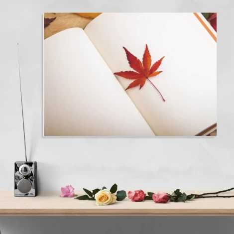 Magnetic whiteboard with a graphic design featuring a red maple leaf on a white background.