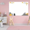 Dry-erase magnetic board with an alpaca bear design, perfect for a child\'s room with pink walls and light furniture.