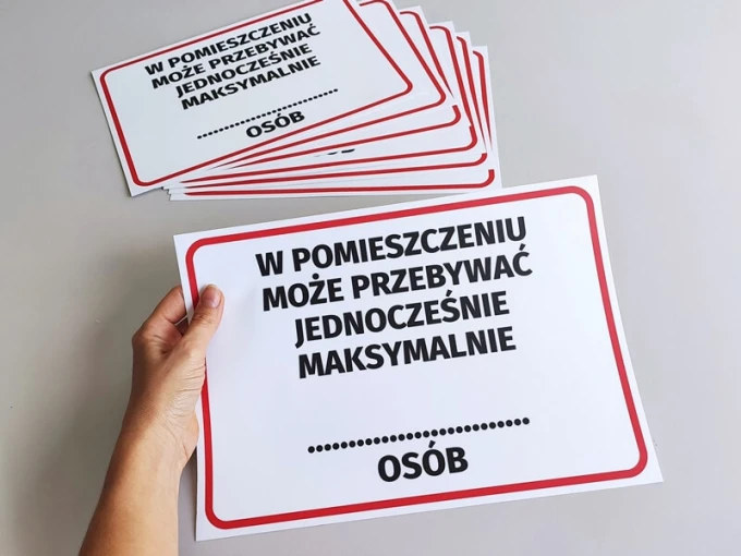 Sticker: Maximum ... people allowed in the room - Graphic design. Simple text on a white background.