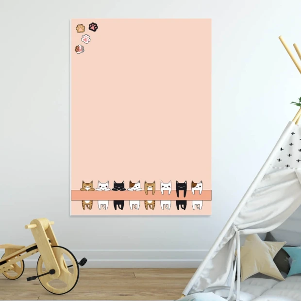 Magnetic dry-erase board for kids featuring colorful cats on a light pink background.