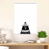 Dry-erase magnetic board for kids featuring a black bear in a sweater on a white background.