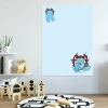 Dry-erase magnetic board for kids featuring a blue monster design.